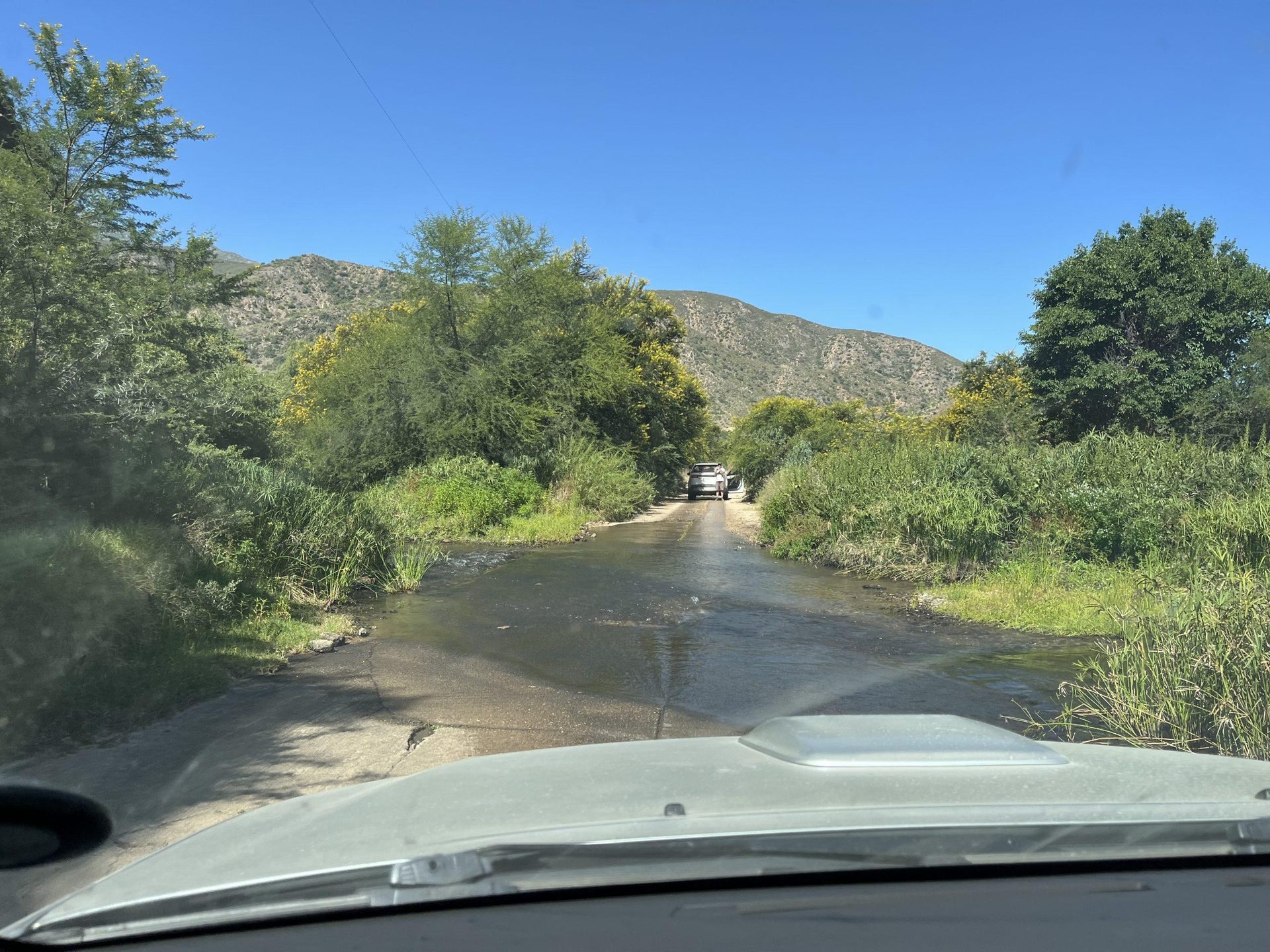 A river crossing through the windscreen