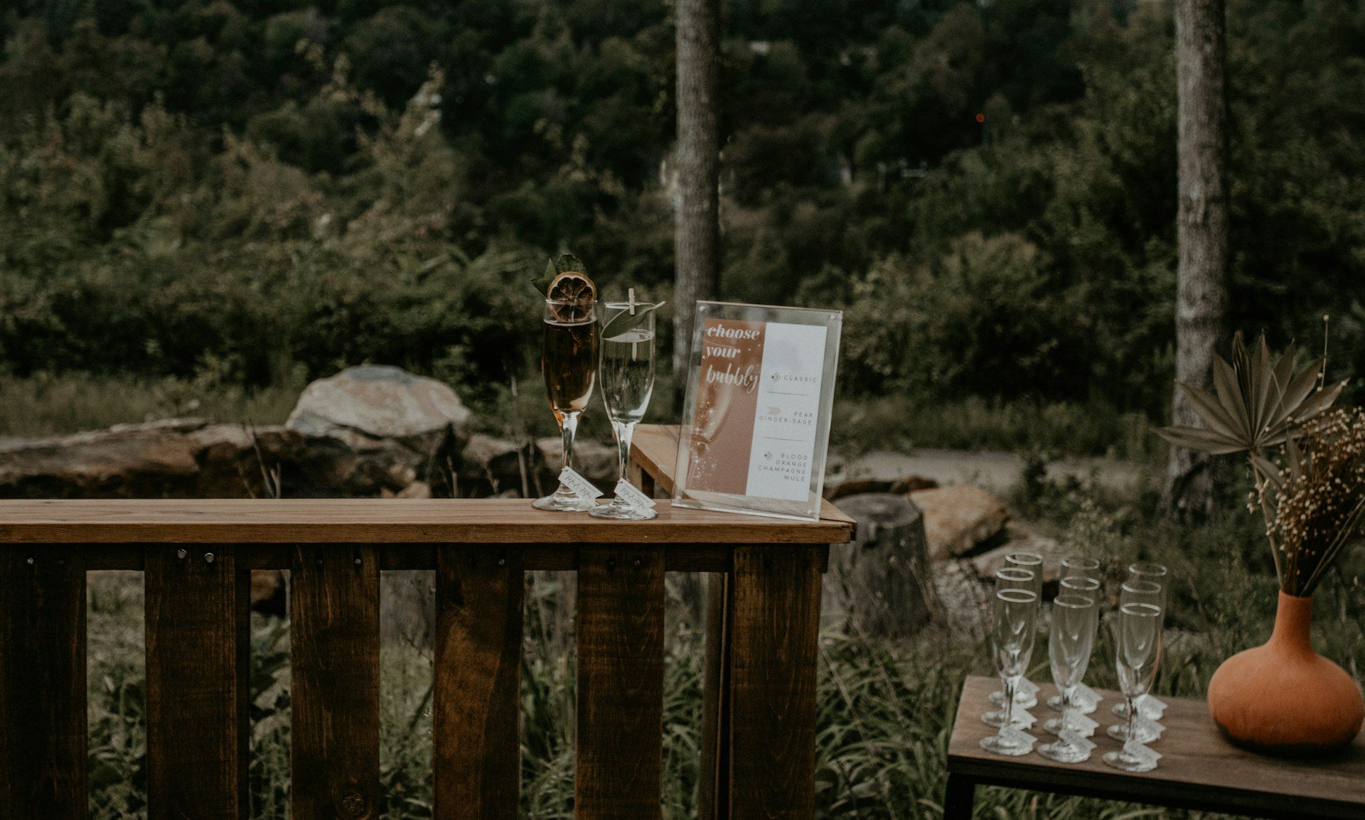Champagne on a deck in the bush