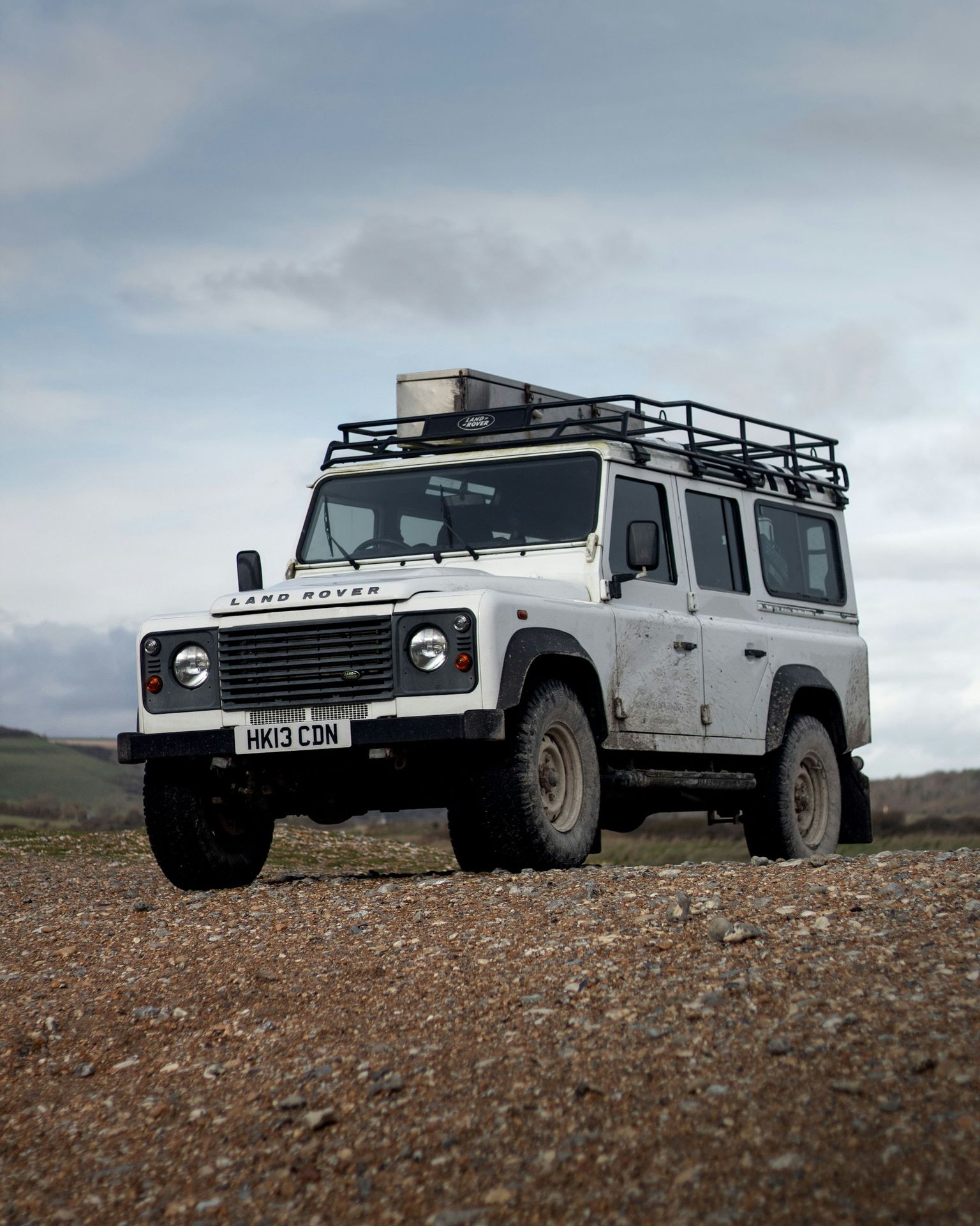 A factory-standard Defender on the gravel