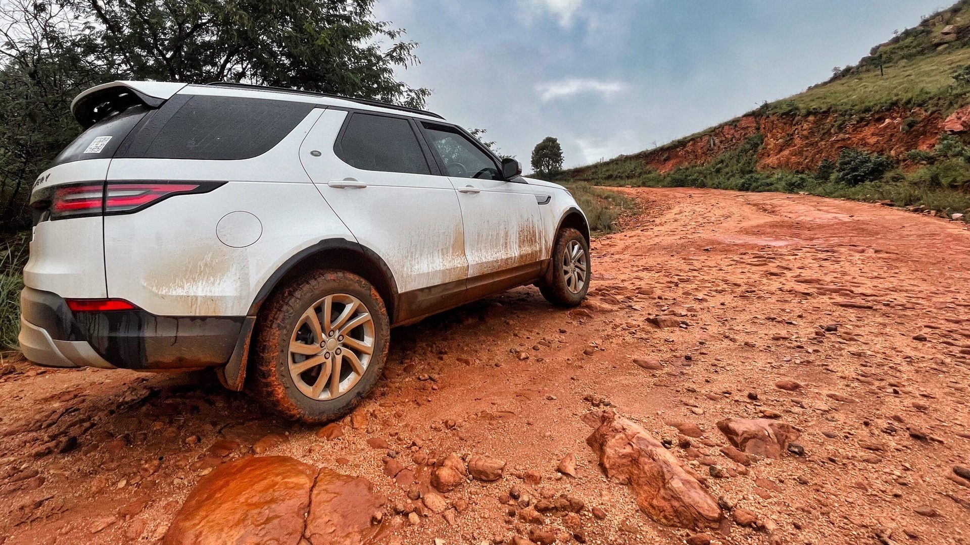 A factory-standard Discovery on red earth