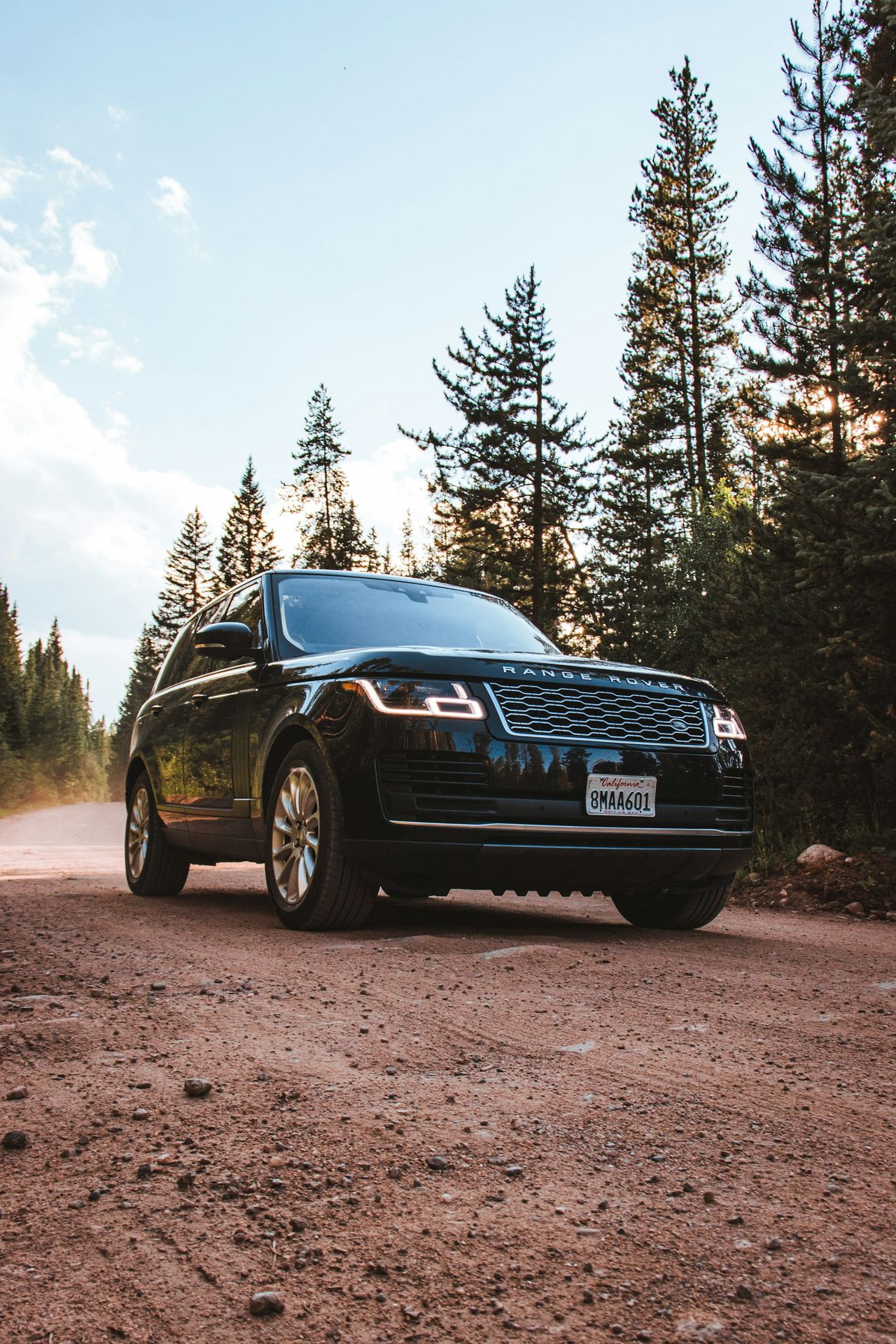 A factory-standard Range Rover on a dirt road